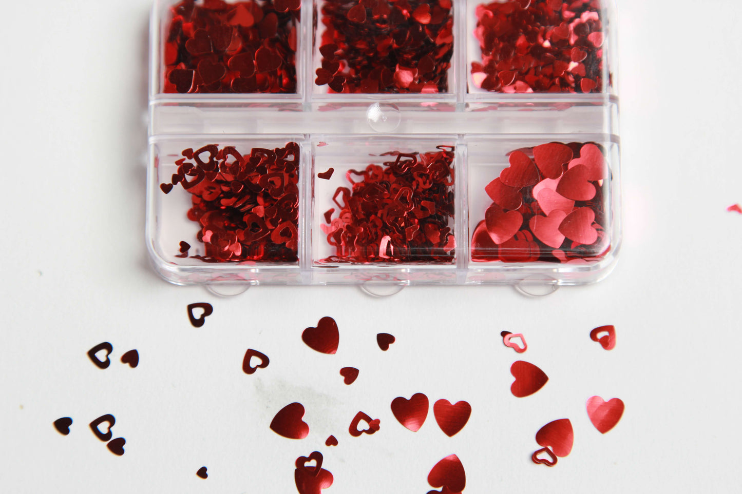 Elevate your manicure with our Blaque D' Youre heart-shaped sequin nail art decorations. Our high-quality supplies make it easy to create stunning and unique designs, perfect for any occasion. Whether you're a professional nail artist or looking to add some flair to your at-home manicure, our heart-shaped sequins are versatile and can be used to create a subtle accent nail or a full-blown heart-inspired design. Shop now and let your heart shine with our nail art supplies!